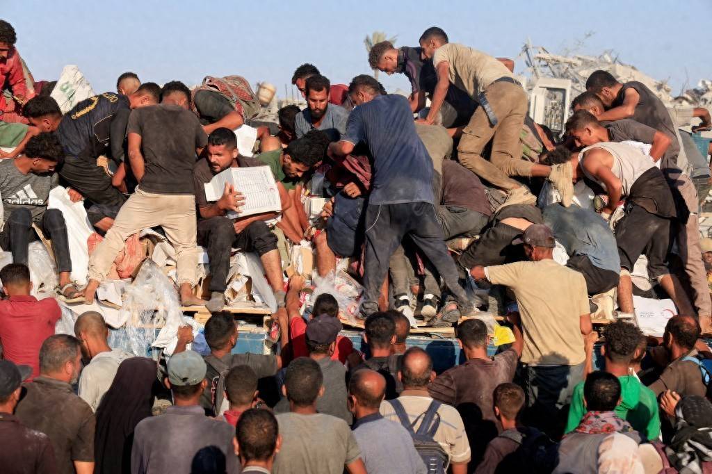 人道物资沦为战争货币!联合国报告撕开残酷真相:每车援助仅12%抵达平民手中